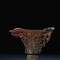 A large and superbly carved archaistic 'chilong' libation cup