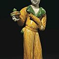 A rare glazed pottery figure of a foreign tribute bearer, Tang dynasty, 8th century