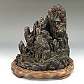 A carved chinese chenxiang-wood of mountain scenery