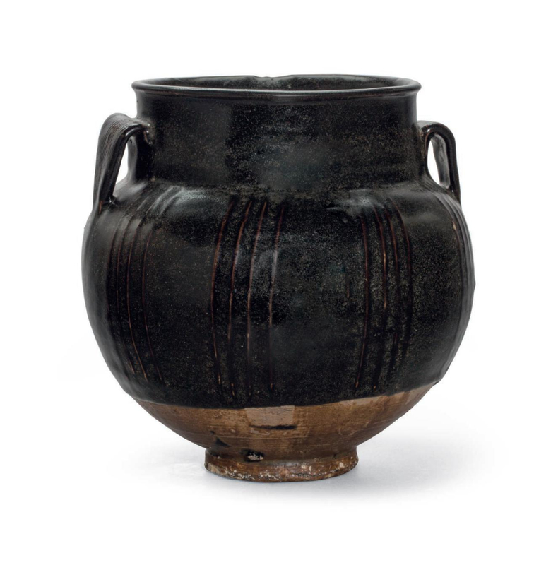 A large black-glazed ribbed jar, China, Northern Song-Jin dynasty (AD 960-1234)